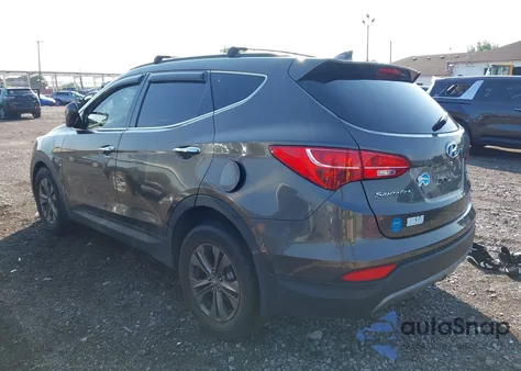 2014 Hyundai Santa Fe Sport 2.4L z USA, uszkodzony, nr VIN 5XYZUDLB4EG207802